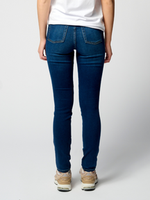 Le jean skinny de performance original - Donim bleu foncé