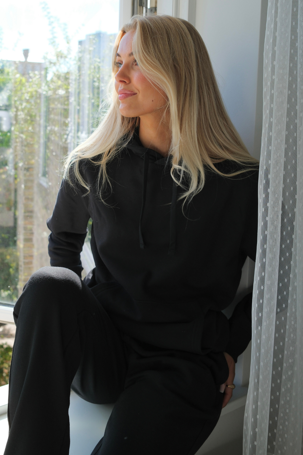 Essentiële hoodie - zwart