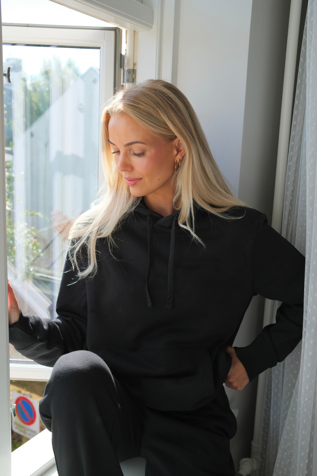 Essentiële hoodie - zwart